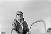 Alfred Saiten sawing wood. Colville Lake, NWT, 1966. 