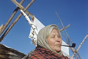 “Onte” – Catherine Zole smoking a pipe. Fort Norman (Tulita), NWT, 1949.