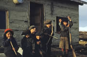 Children playing. Fort Franklin (Deline), NWT, 1950.