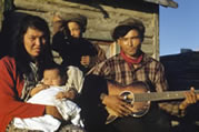 Johnny and Alice Neyelle and children. Fort Franklin (Deline) NWT, 1959. 