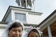 Georgina Cleary and Bernadette Taniton dressed up for a wedding. Fort Franklin (Deline), NWT, 1950. 